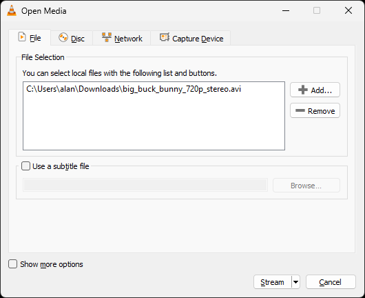 The 'Open Media' dialog in VLC, showing a video file added to the file selection.